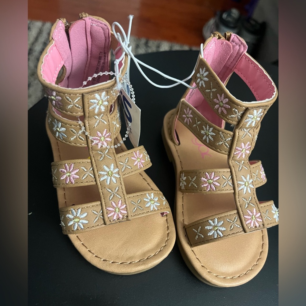 New flower sandals with zipper. Size 5